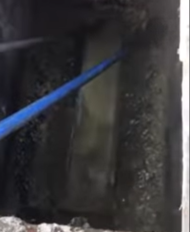 Mold and sewage buildup inside ductwork requiring professional cleanup and sanitization